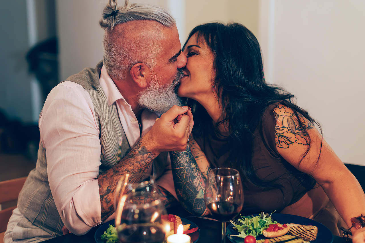 Valentines day menu showing a couple enjoying red wine - featured image